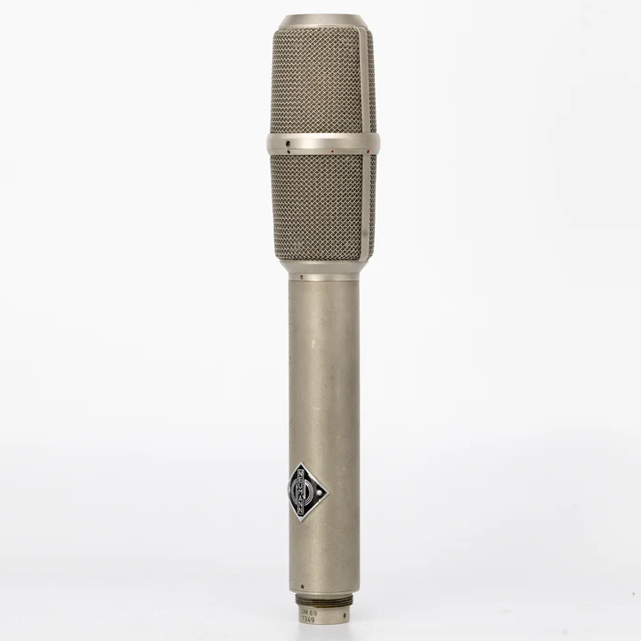 Side view of Neumann SM69 tube microphone with metallic finish