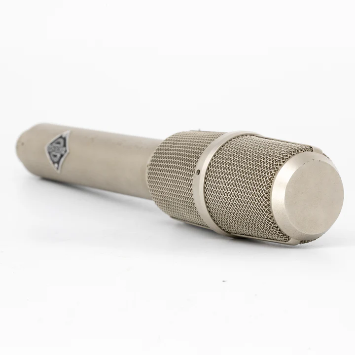 Angled view of Neumann SM69 tube microphone lying flat